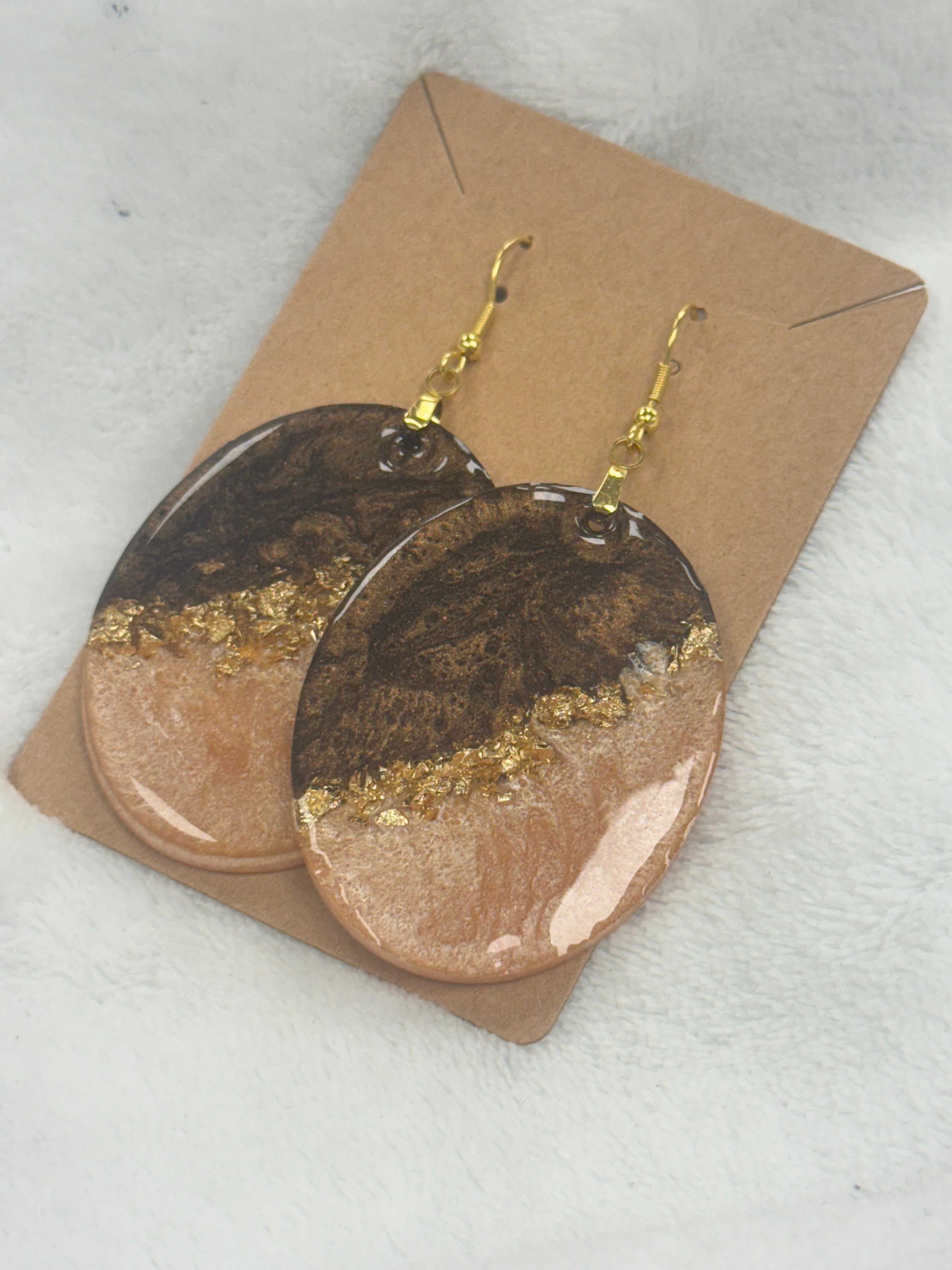 Brown and gold oval resin